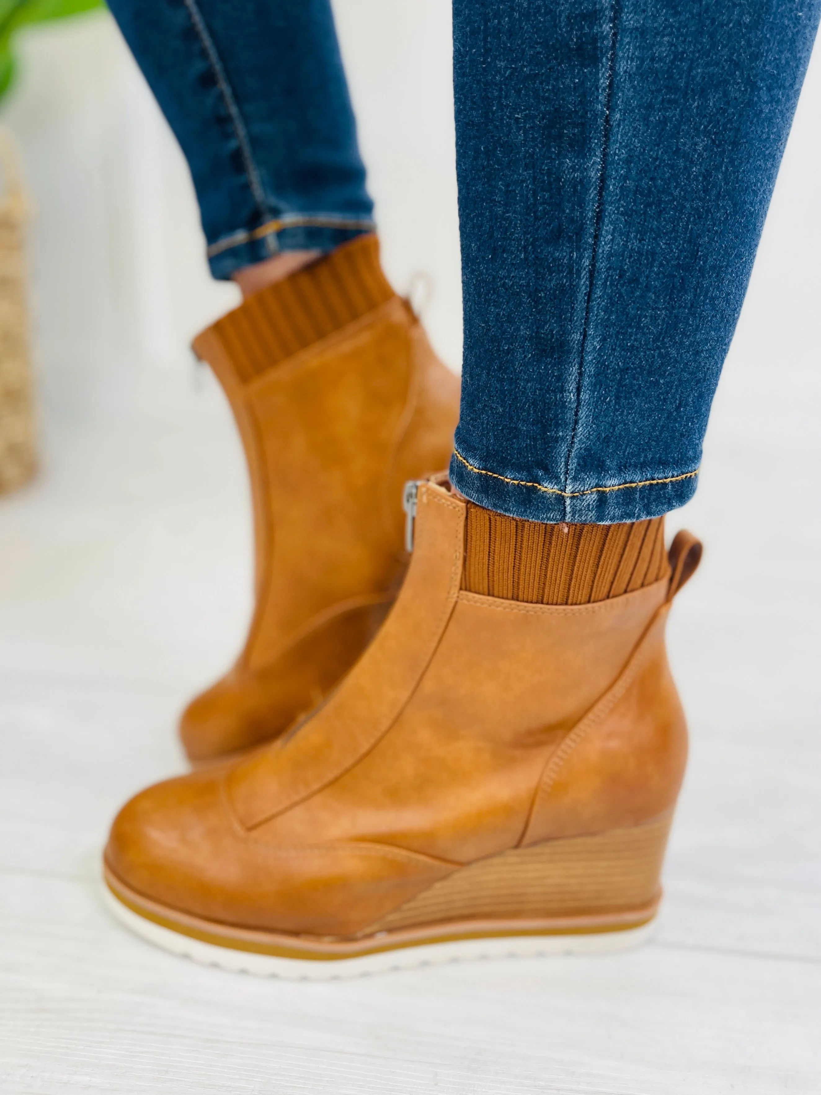 Chase The Style Wedge Boots In Tan