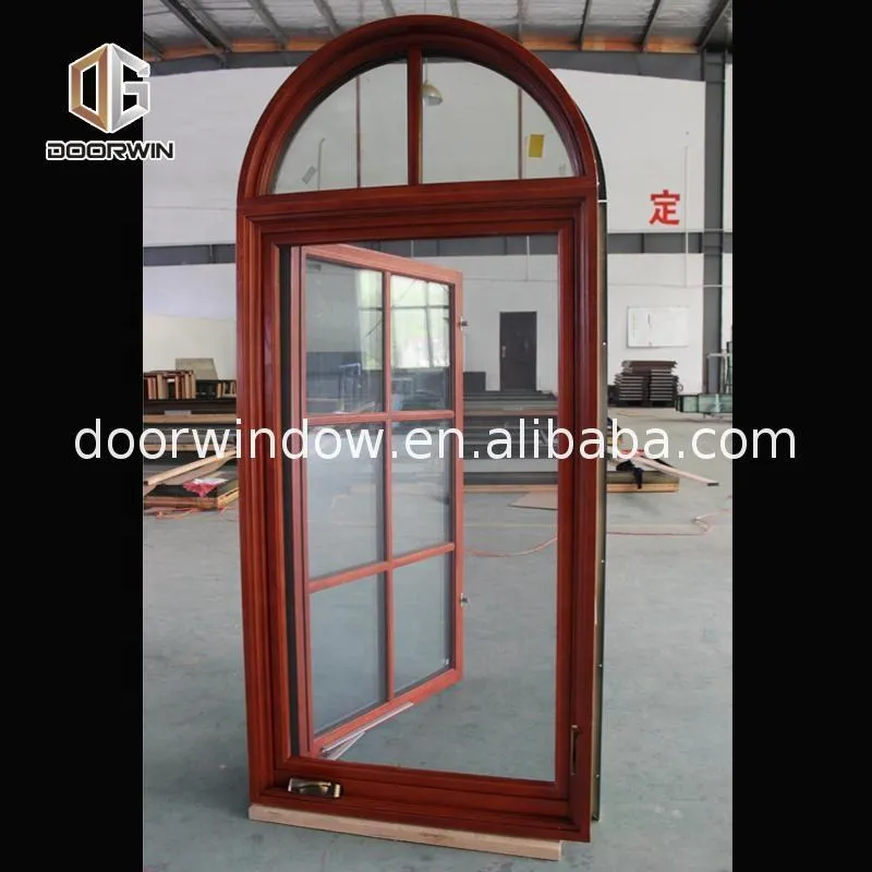 Doorwin 2021-American casement window grill design wooden crank open outward arched top window by Doorwin on Alibaba