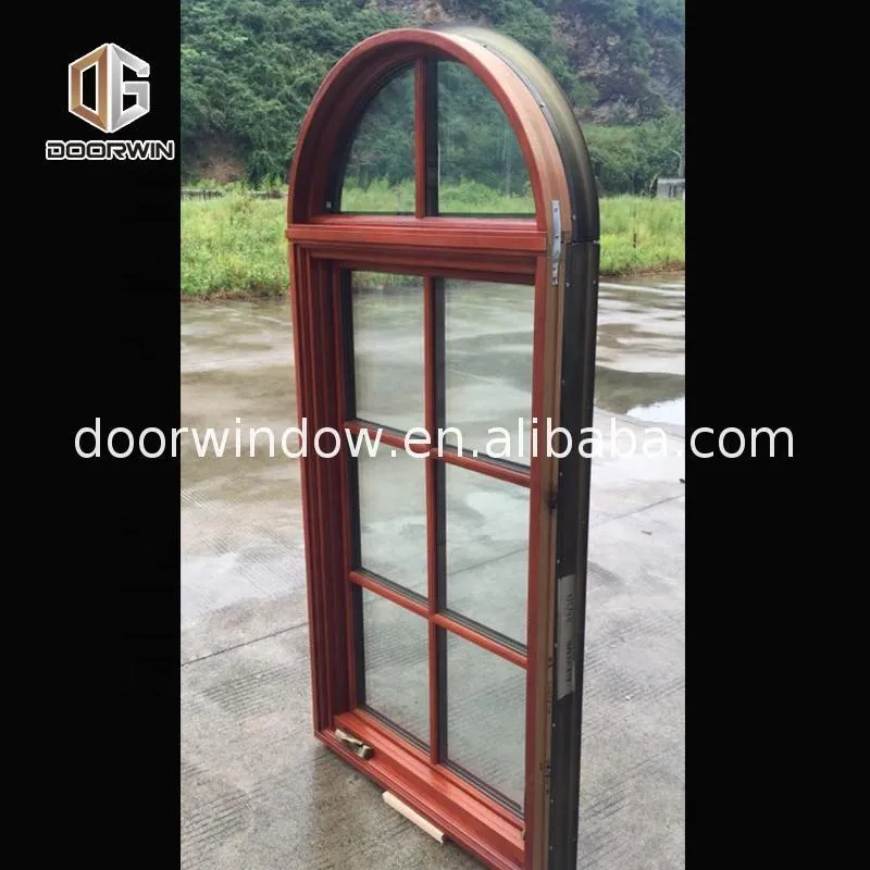 Doorwin 2021-American casement window grill design wooden crank open outward arched top window by Doorwin on Alibaba